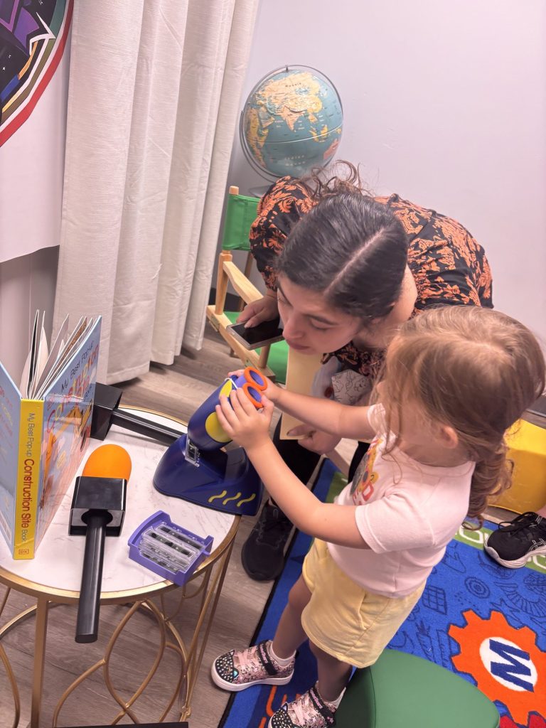 Preschooler exploring with a kids microscope
