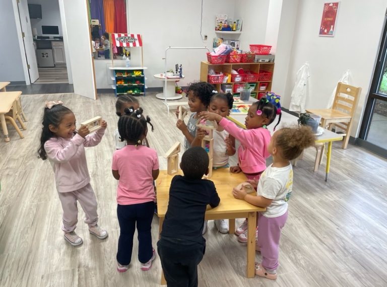Preschoolers moving and playing together in the Dream STEAM Academy Innovation Room